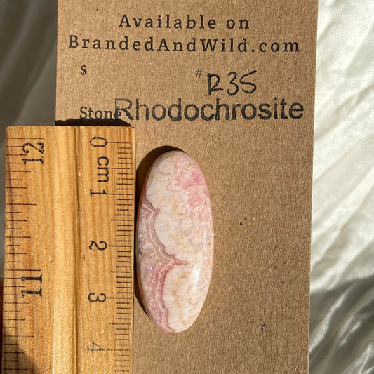 Rhodochrosite Cabochon - R35 89BD3EA0-DAAA-4D88-9A05-EA81F72FB85B Brandedandwild.com