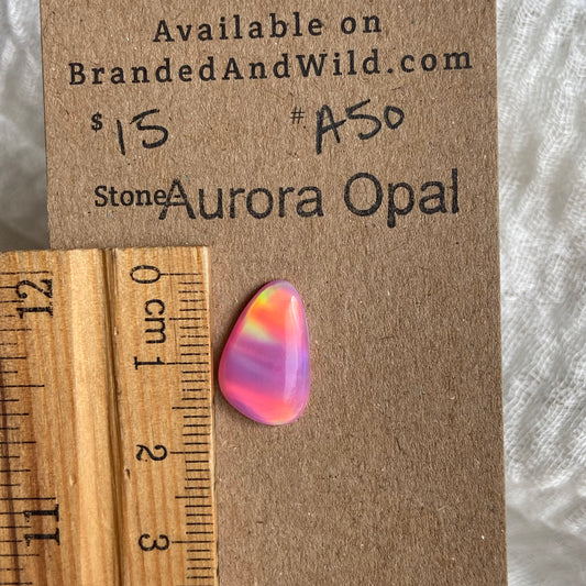 Aurora Opal Cabochon - A50 89F258AF-663D-4D8A-9B1F-80867EA372AD Brandedandwild.com