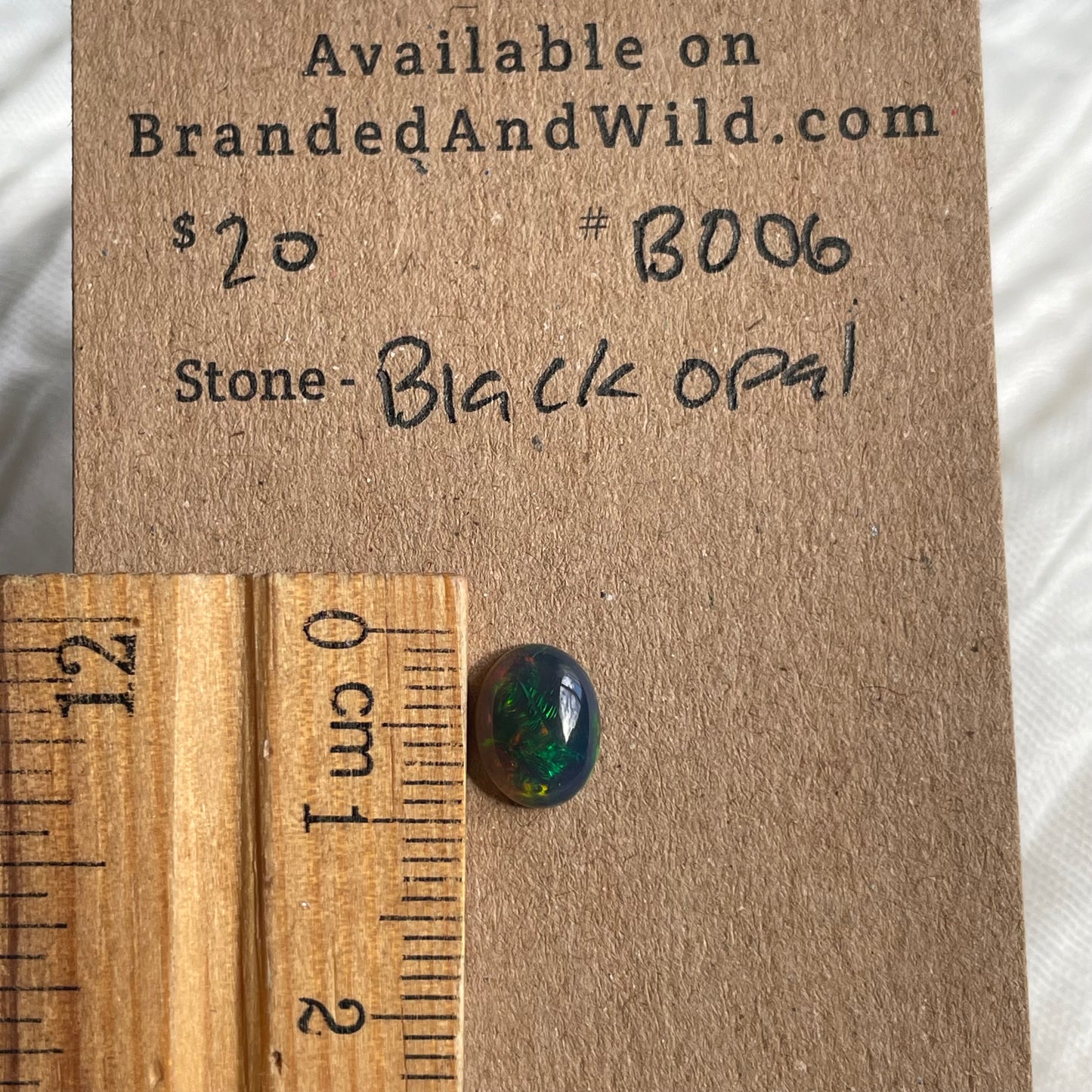 Black Opal - Cabochon - B006 8BF35B1B-F8BF-4916-A117-B43D91641505 Brandedandwild.com