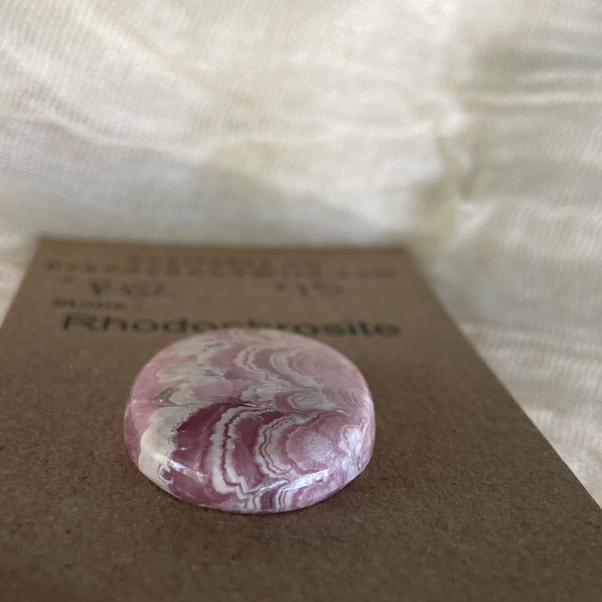 Rhodochrosite Cabochon - R82 8C072FCF-F0CC-4DC0-AF2C-00B9A6BD9D92 Brandedandwild.com