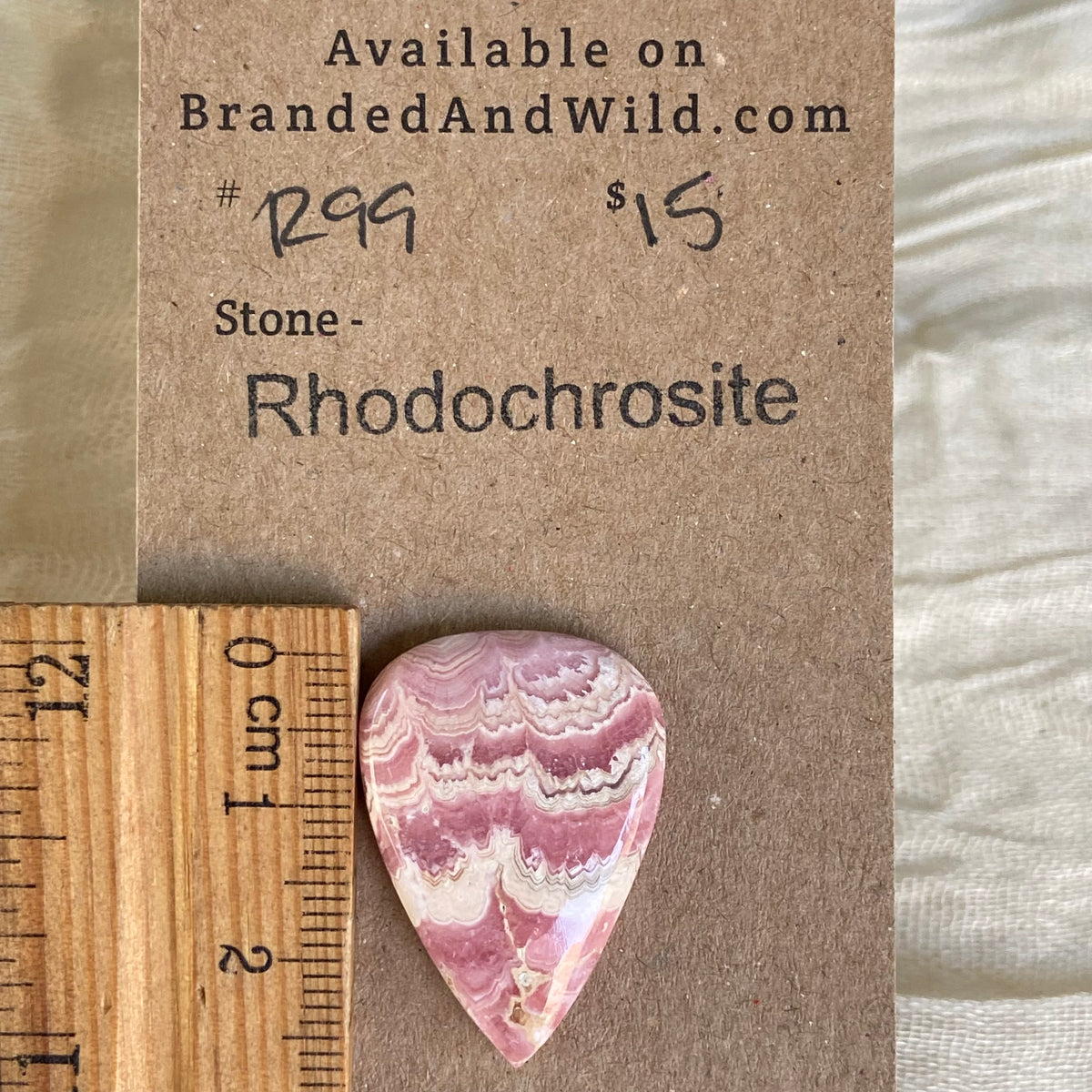 Rhodochrosite Cabochon - R99 93A29123-3192-4404-A567-617038DBD1D8 Brandedandwild.com