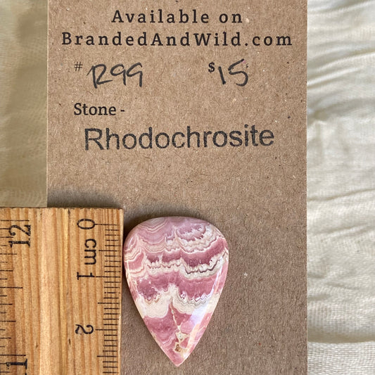 Rhodochrosite Cabochon - R99 93A29123-3192-4404-A567-617038DBD1D8 Brandedandwild.com