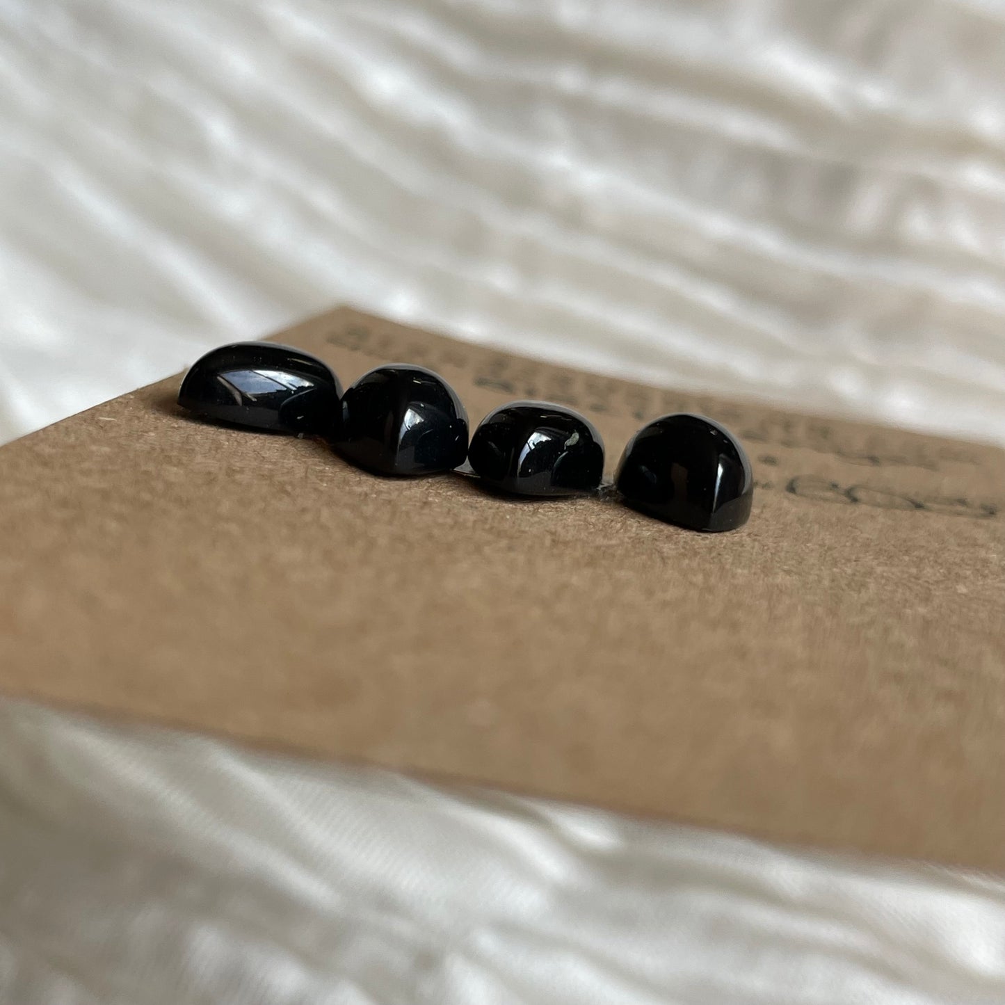 Black Onyx - Cabochon - B033 97A118D8-665E-4C6E-81C2-C3DB4A253E09 Brandedandwild.com