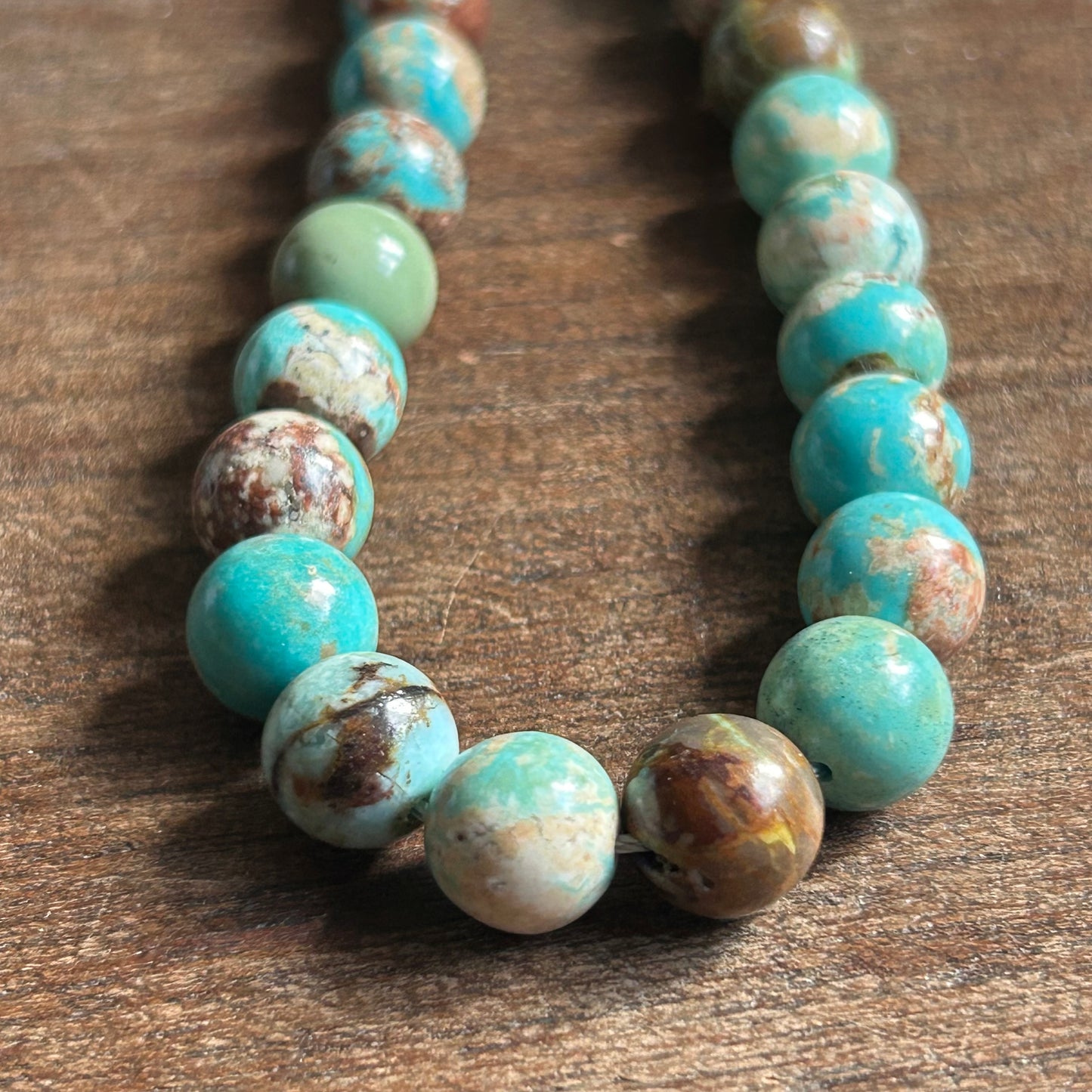 10-10.8 mm Natural Turquoise (Smooth Round) 9938AAF0-6A15-493D-8145-6AED6FCAA9E3 Brandedandwild.com