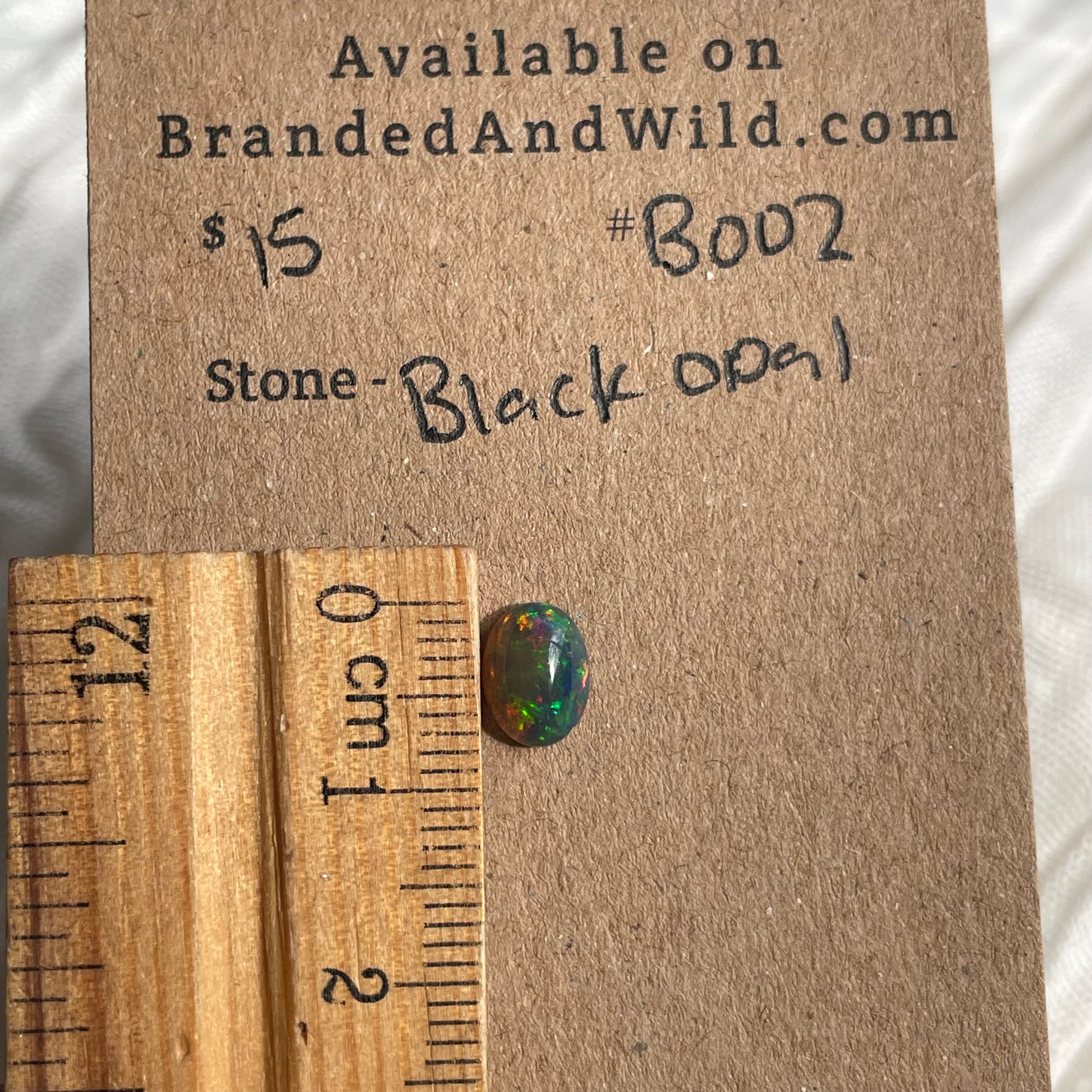 Black Opal - Cabochon - B002 997BDD87-B3C6-4A7D-BB6A-05620F7F193F Brandedandwild.com