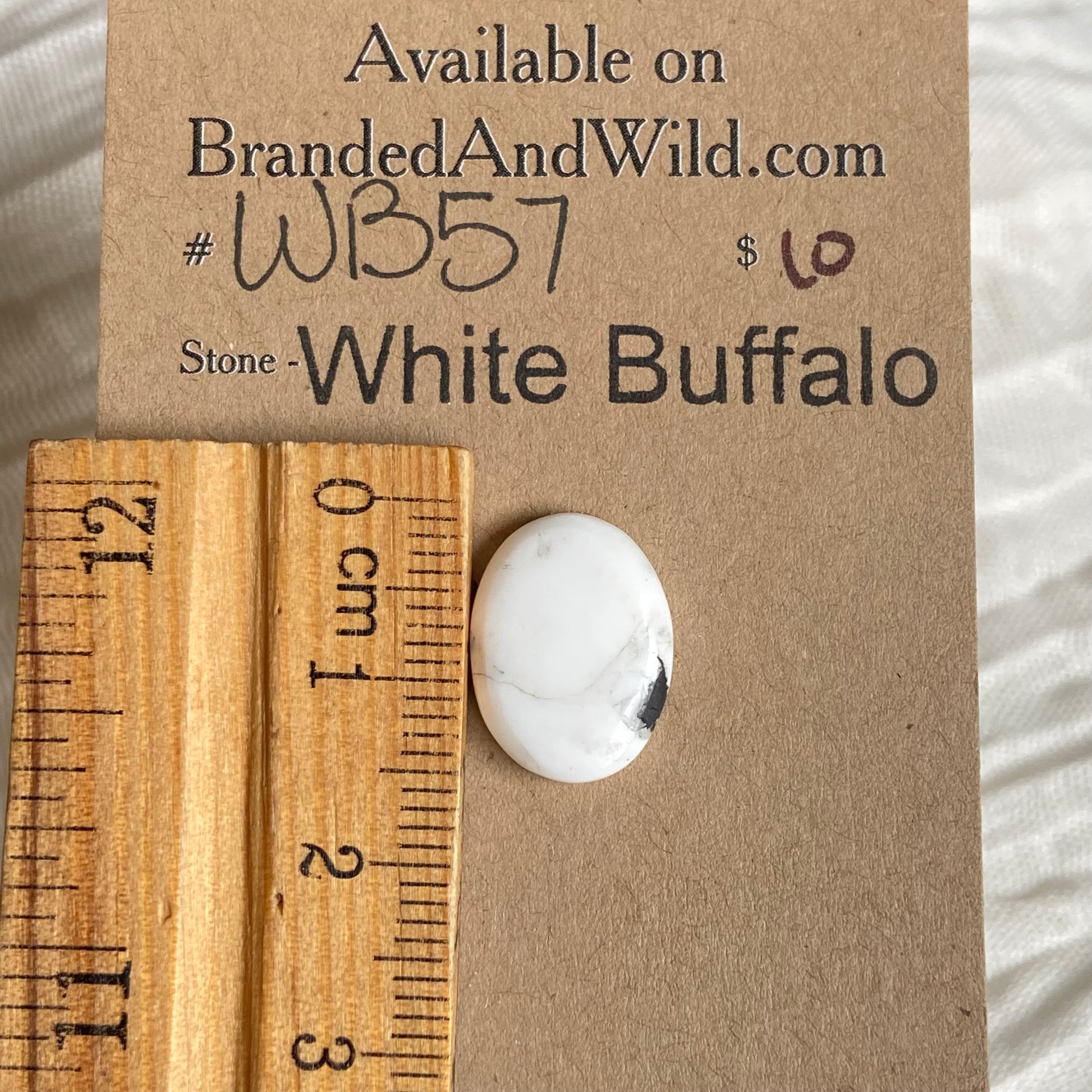 White Buffalo Cabochon - WB57 9A2BFA94-DB10-4B6F-8AFC-665A66D53CC8 Brandedandwild.com