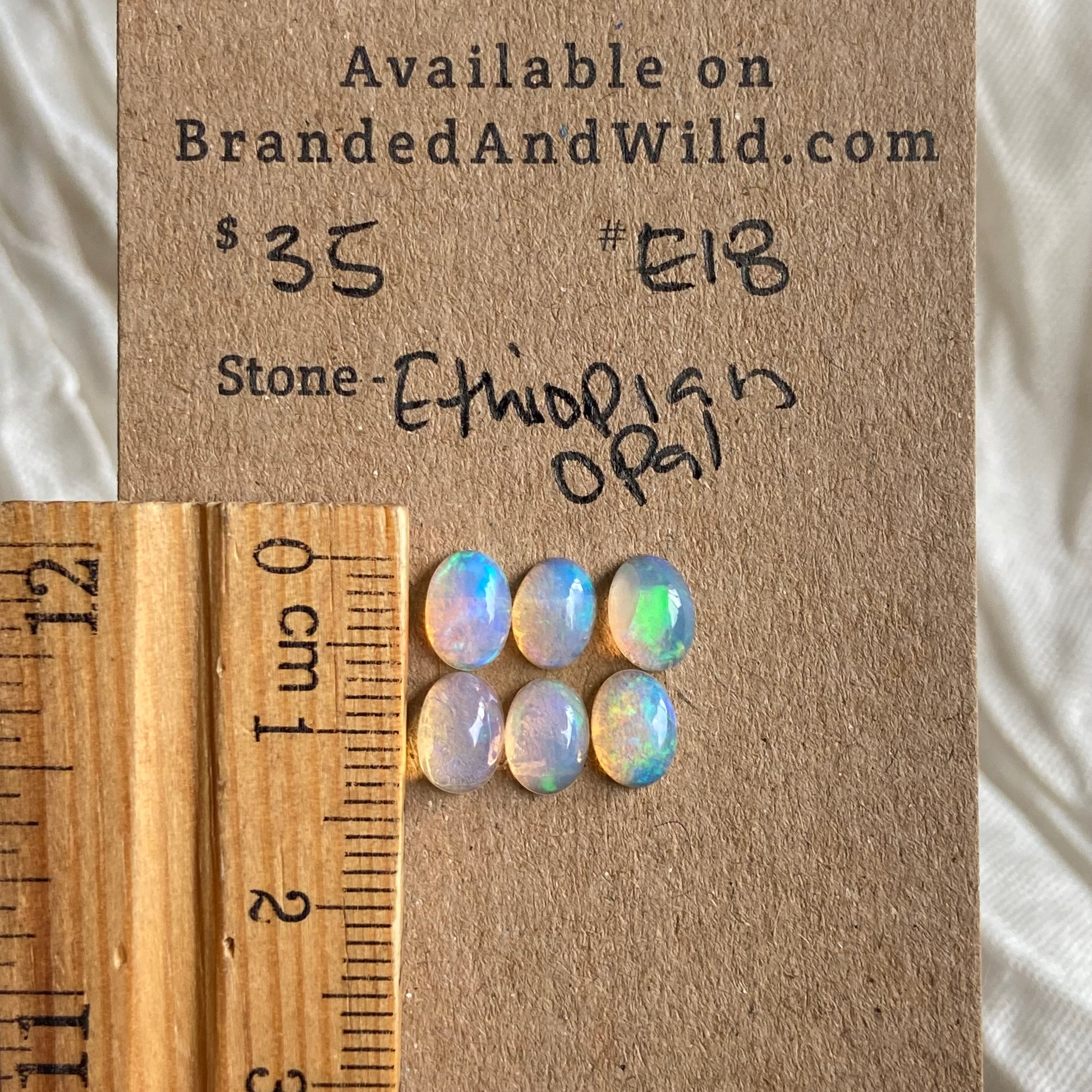 Ethiopian Opal Cabochon - E18 9CE296C9-5A3D-4B63-B050-8378F77A6639 Brandedandwild.com