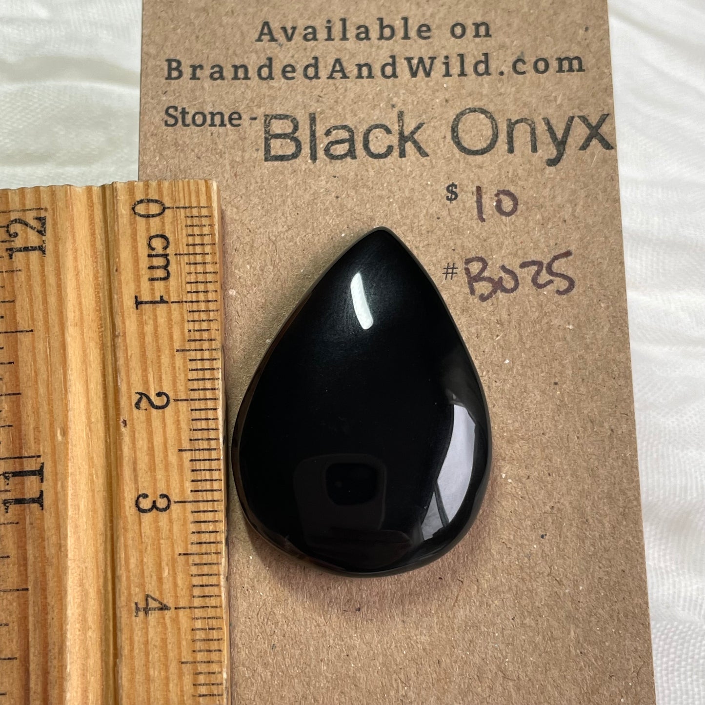 Black Onyx - Cabochon - BO25 A73170B0-5190-47F7-B0BA-01F6CCB9063C Brandedandwild.com