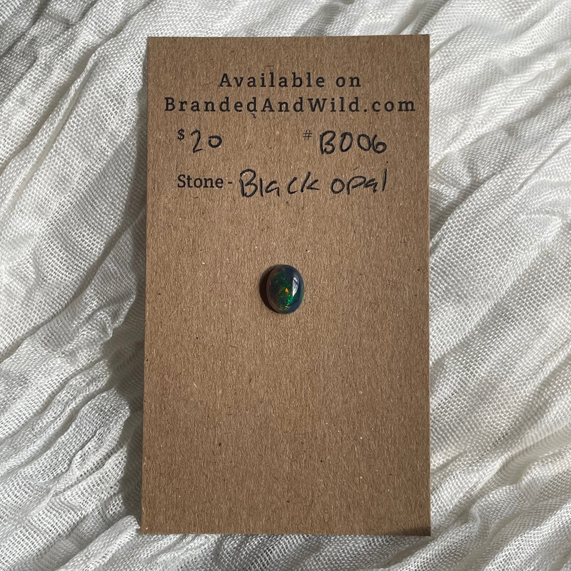 Black Opal - Cabochon - B006 B323381B-A50D-419C-910B-99C1F28E22DC Brandedandwild.com