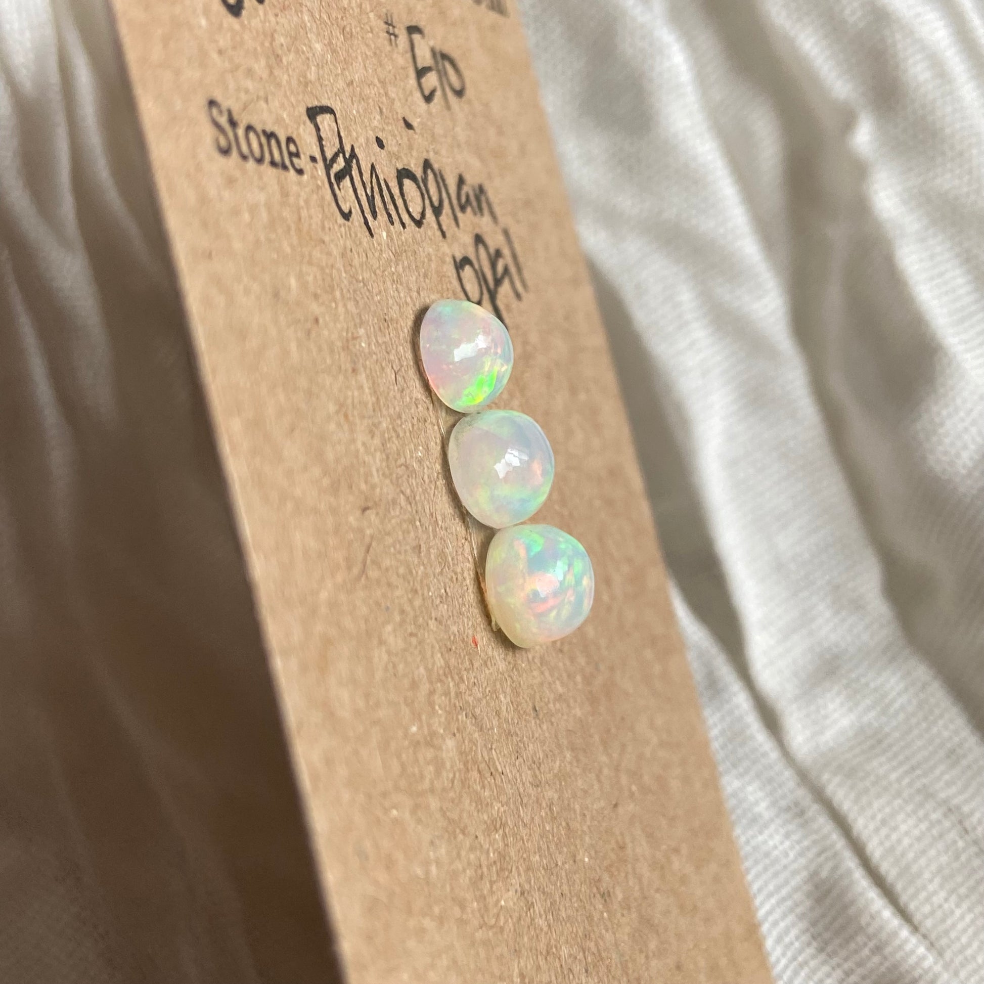 Ethiopian Opal Cabochon - E10 C0422217-FA72-4B13-BB38-1C01F0243D51 Brandedandwild.com