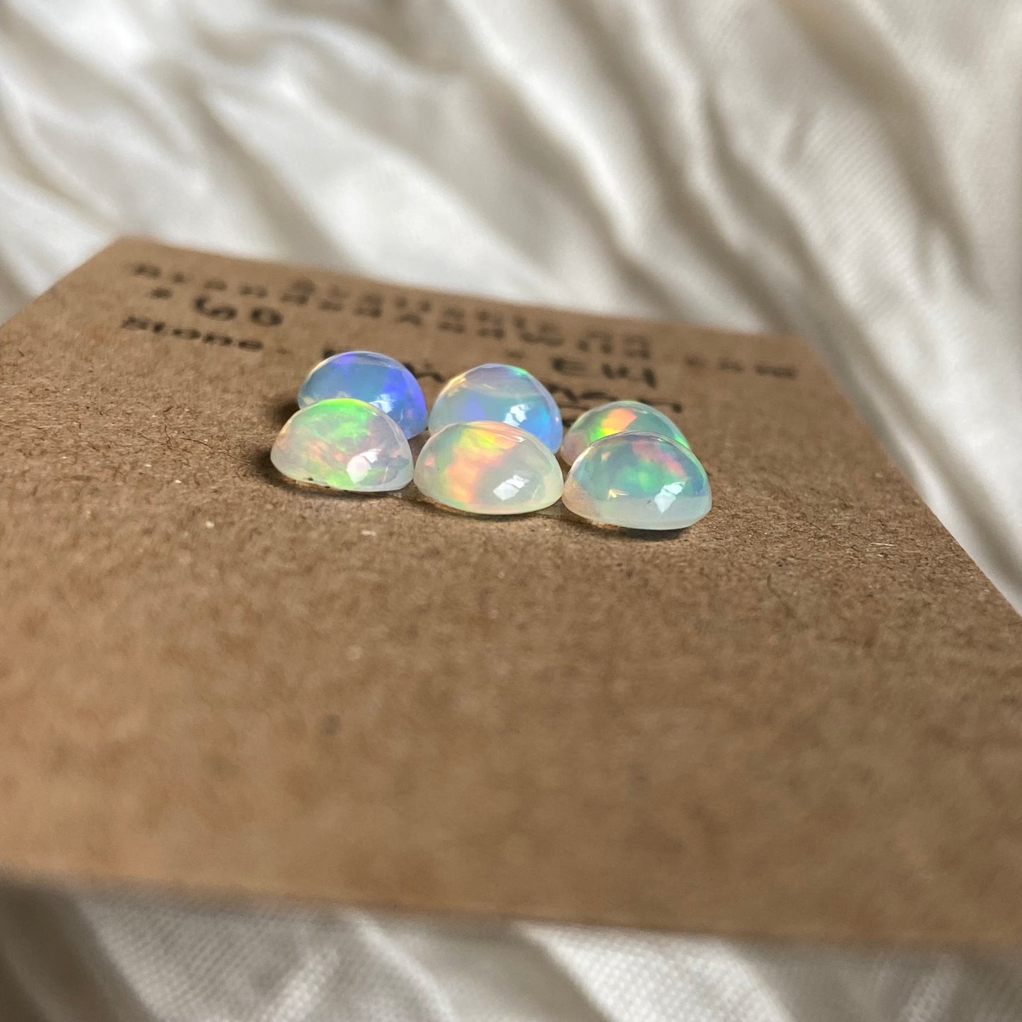 Ethiopian Opal Cabochon - E14 C47EBEAF-6E6F-410F-AE4B-8C709F696CA5 Brandedandwild.com