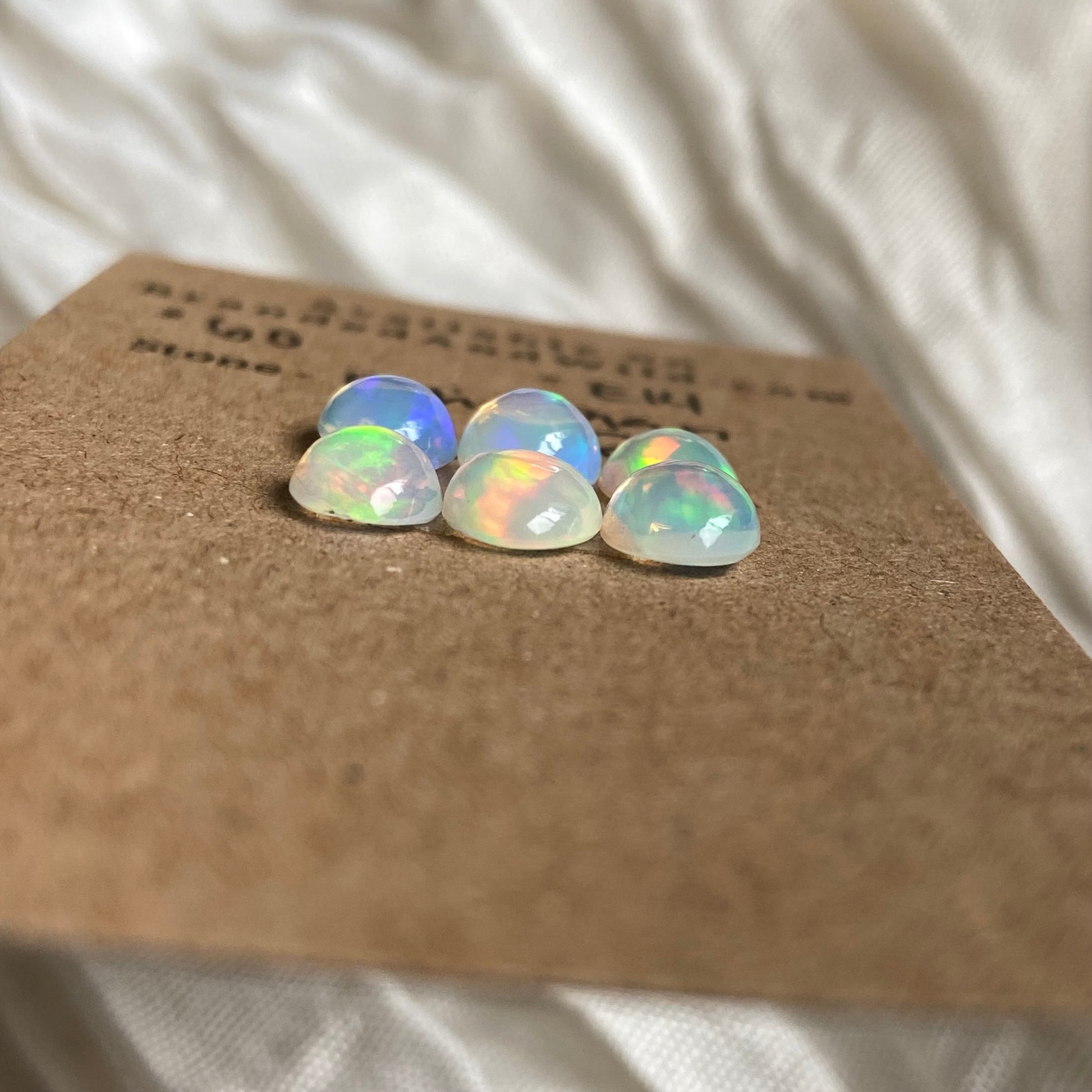 Ethiopian Opal Cabochon - E14 C47EBEAF-6E6F-410F-AE4B-8C709F696CA5 Brandedandwild.com