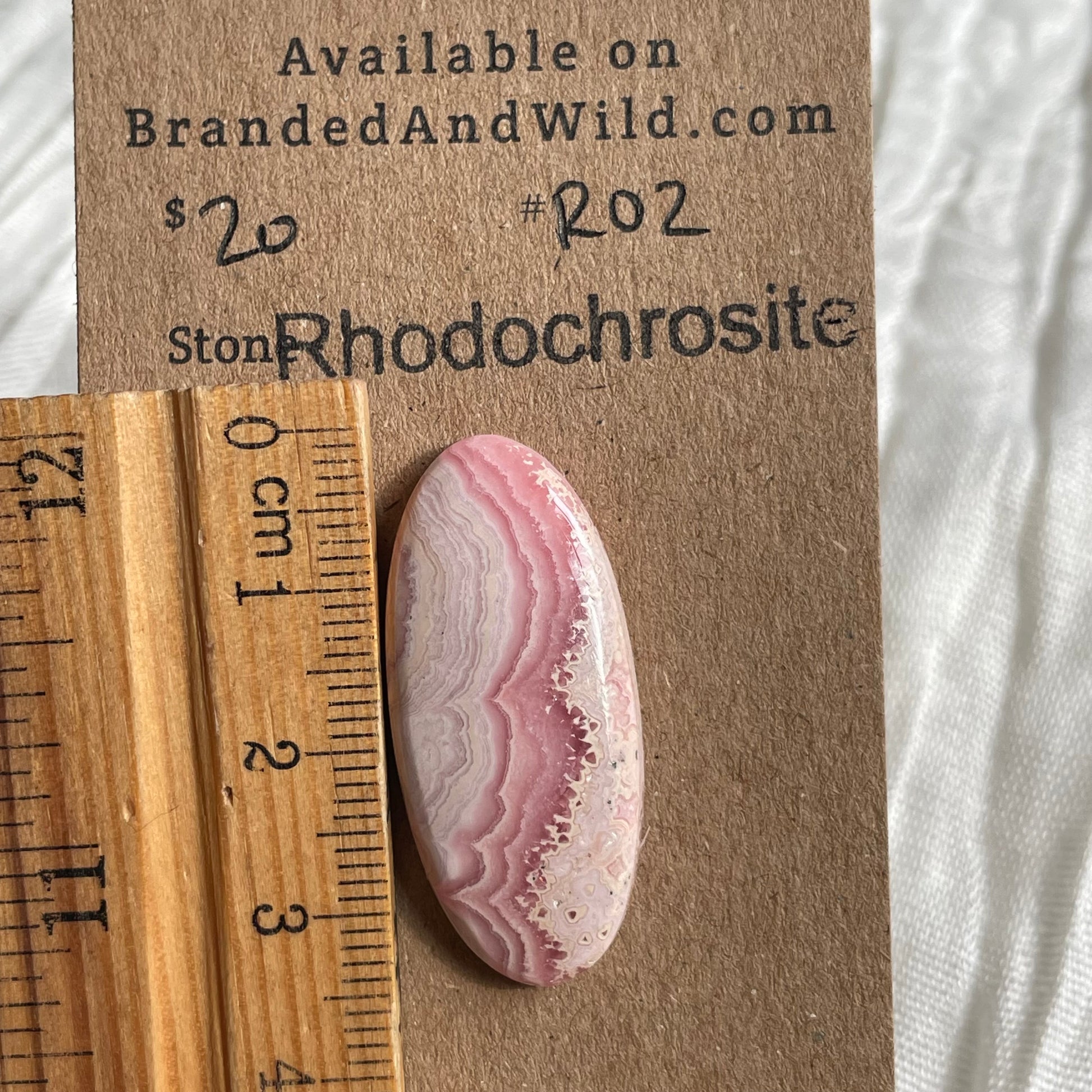 Rhodochrosite Cabochon - R02 C5A6AE58-C91F-44E1-9EB8-515078F6F801 Brandedandwild.com