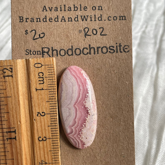 Rhodochrosite Cabochon - R02 C5A6AE58-C91F-44E1-9EB8-515078F6F801 Brandedandwild.com