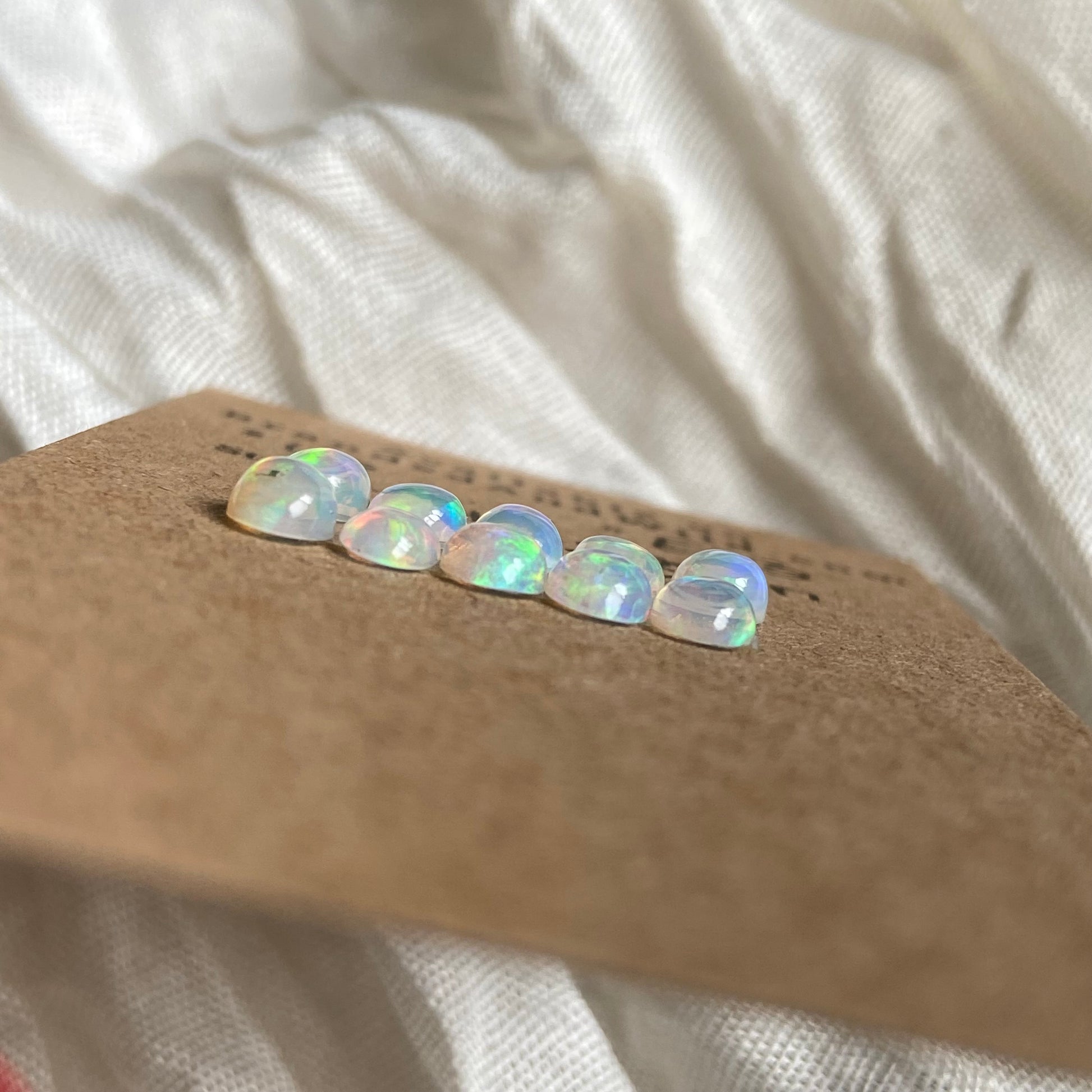 Ethiopian Opal Cabochon - E23 C6431EF8-C8EA-4798-B435-0AF9799FA2D4 Brandedandwild.com