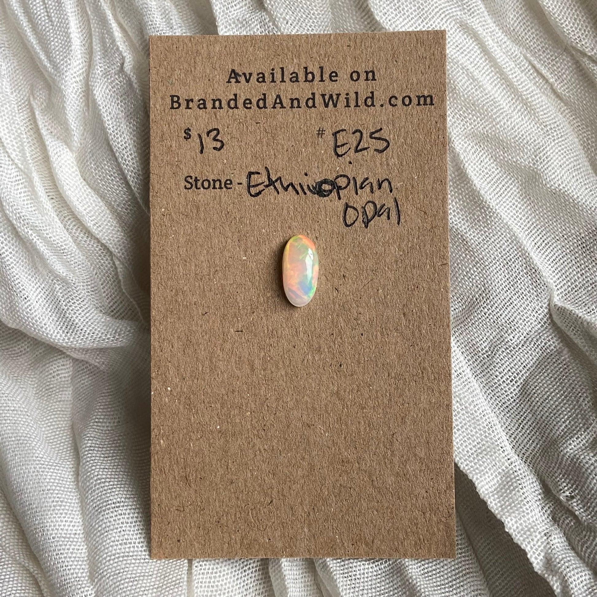 Ethiopian Opal Cabochon - E25 CAD61F4A-35D7-45E5-BF7E-3E9F0490D22E Brandedandwild.com