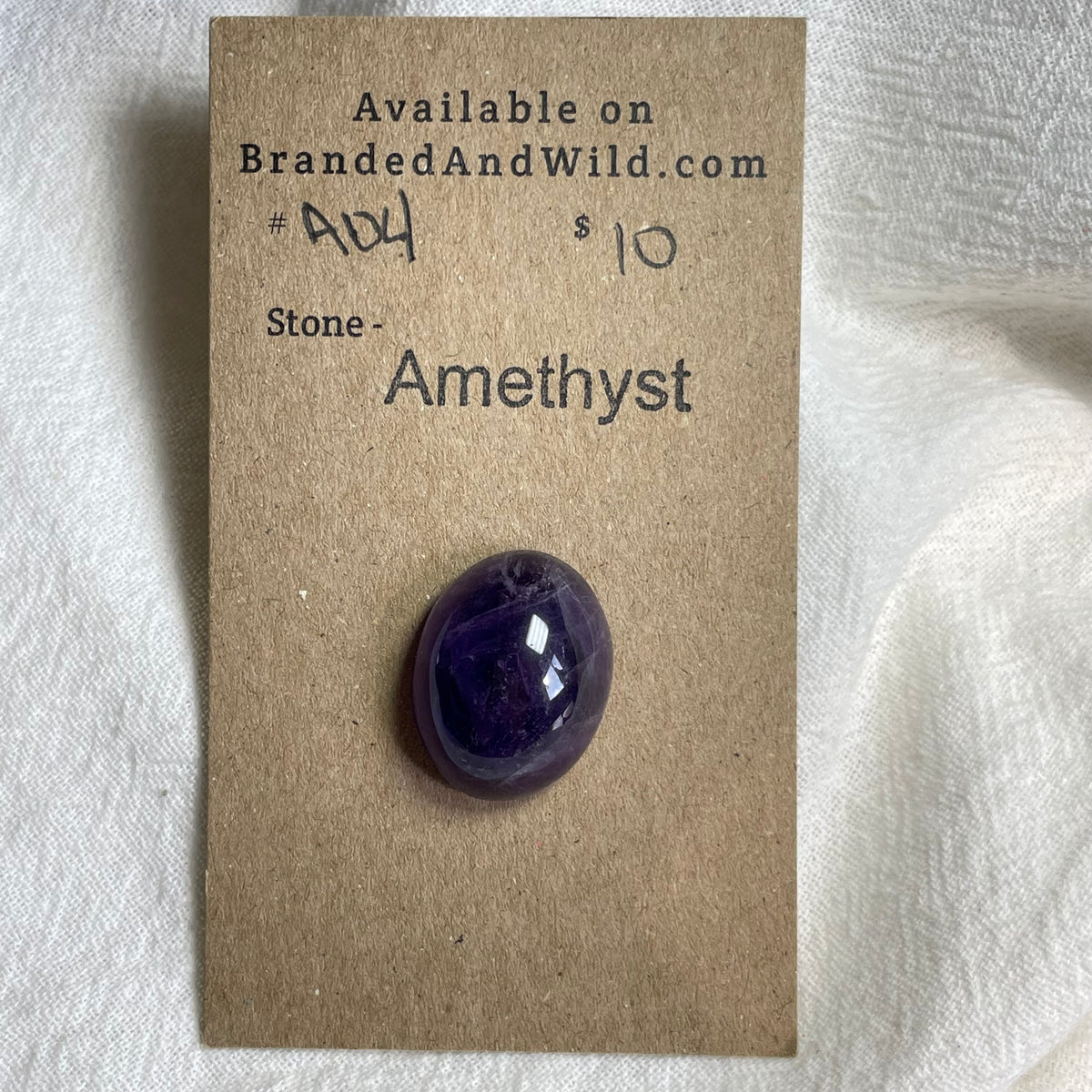 Amethyst Cabochon - A24 CDF2D0A6-F866-45A8-8B4A-B222A3FE7D03 Brandedandwild.com