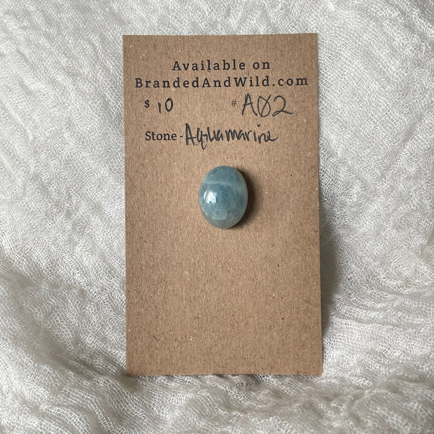 Aquamarine Cabochon AQ2 CEF52803-F3C1-4D5A-8A4A-D9AEA69DF63B Brandedandwild.com
