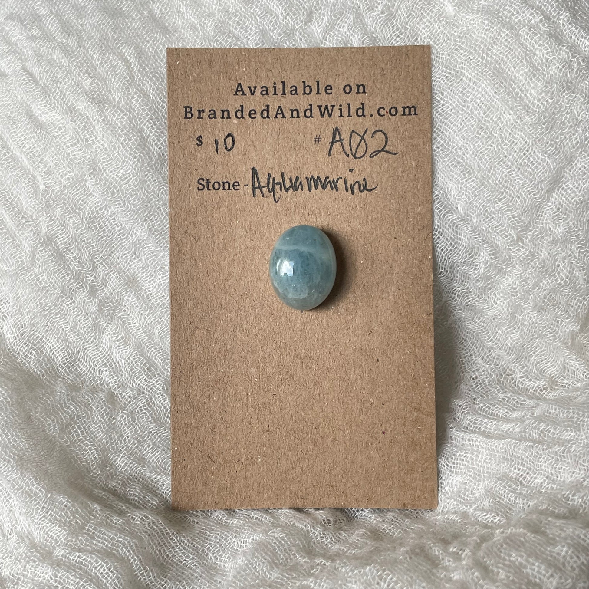 Aquamarine Cabochon AQ2 CEF52803-F3C1-4D5A-8A4A-D9AEA69DF63B Brandedandwild.com