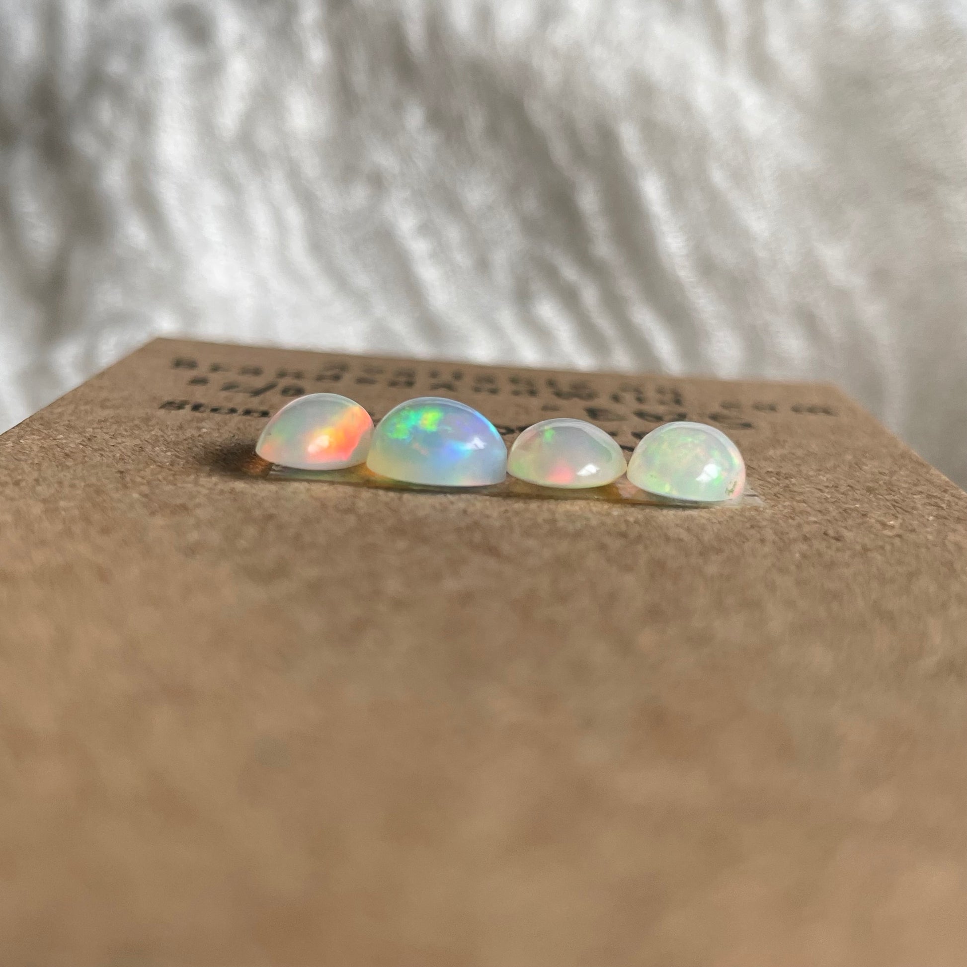 Ethiopian Opal Cabochon - E025 D17A6DB2-CA31-4C04-AF6A-4EF05D6CEAD8 Brandedandwild.com