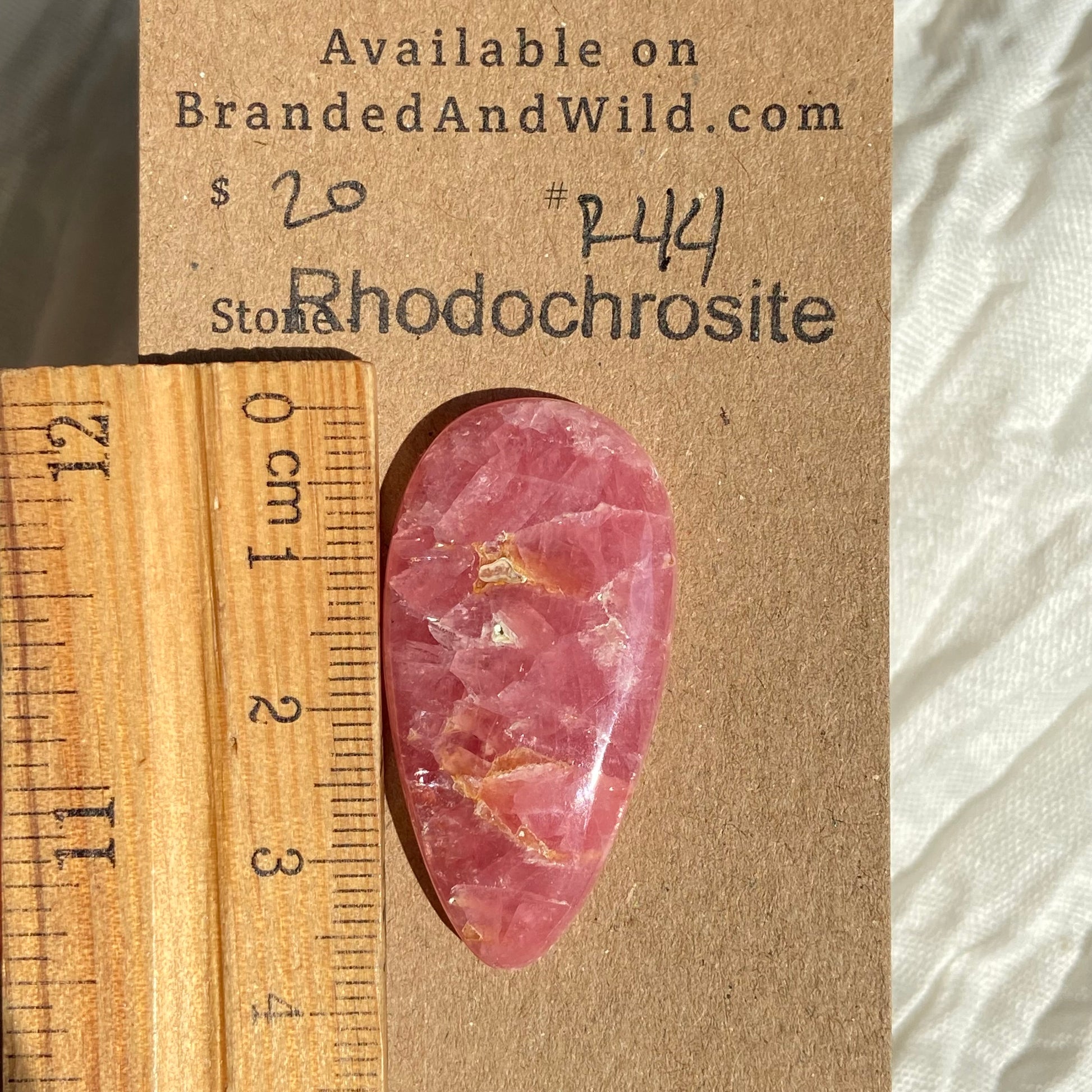 Rhodochrosite Cabochon - R44 D74E2827-51B5-4E79-9F39-4E13AFBFC54C Brandedandwild.com