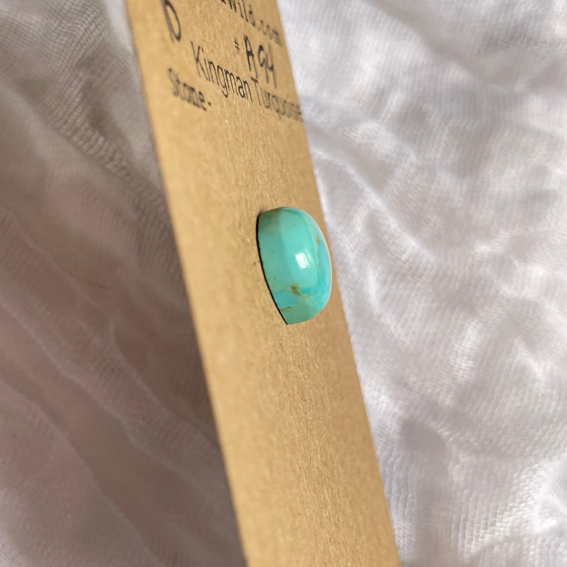 Kingman Turquoise Cabochon - KT94 DE1D5E36-4ED7-4BD0-975E-78E12622798A Brandedandwild.com