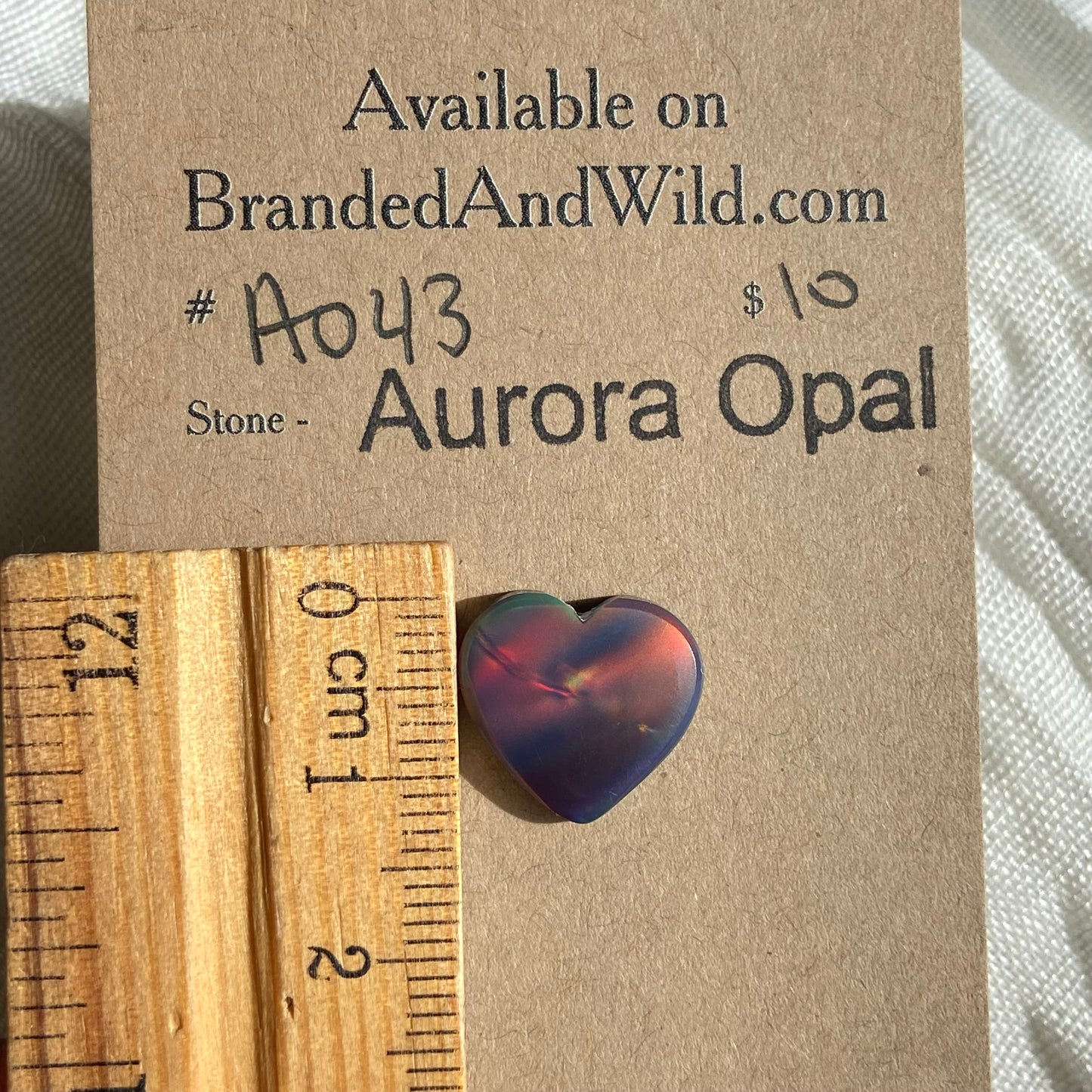 Aurora Opal Cabochon - A043 E2C5B13C-1ED7-40B9-B96A-6D7010717F7E Brandedandwild.com