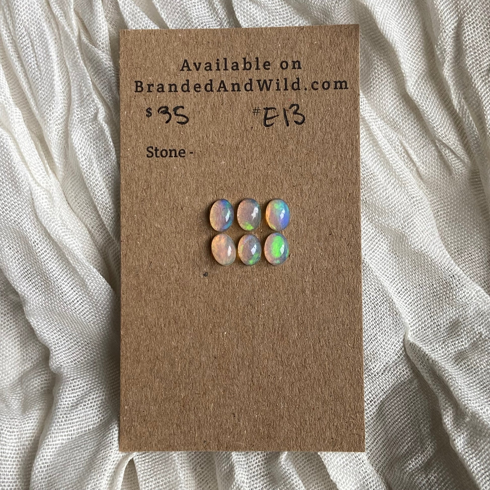 Ethiopian Opal Cabochon - E13 E6AA3BCE-A0BD-4B40-B15D-6ED0ABB0B082 Brandedandwild.com