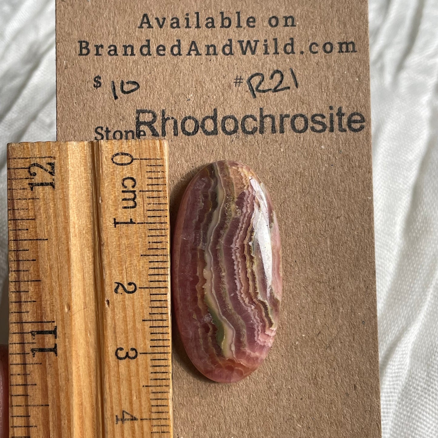 Rhodochrosite Cabochon - R21 E768F7BF-2568-4D1E-B0ED-1A23D628A8A0 Brandedandwild.com