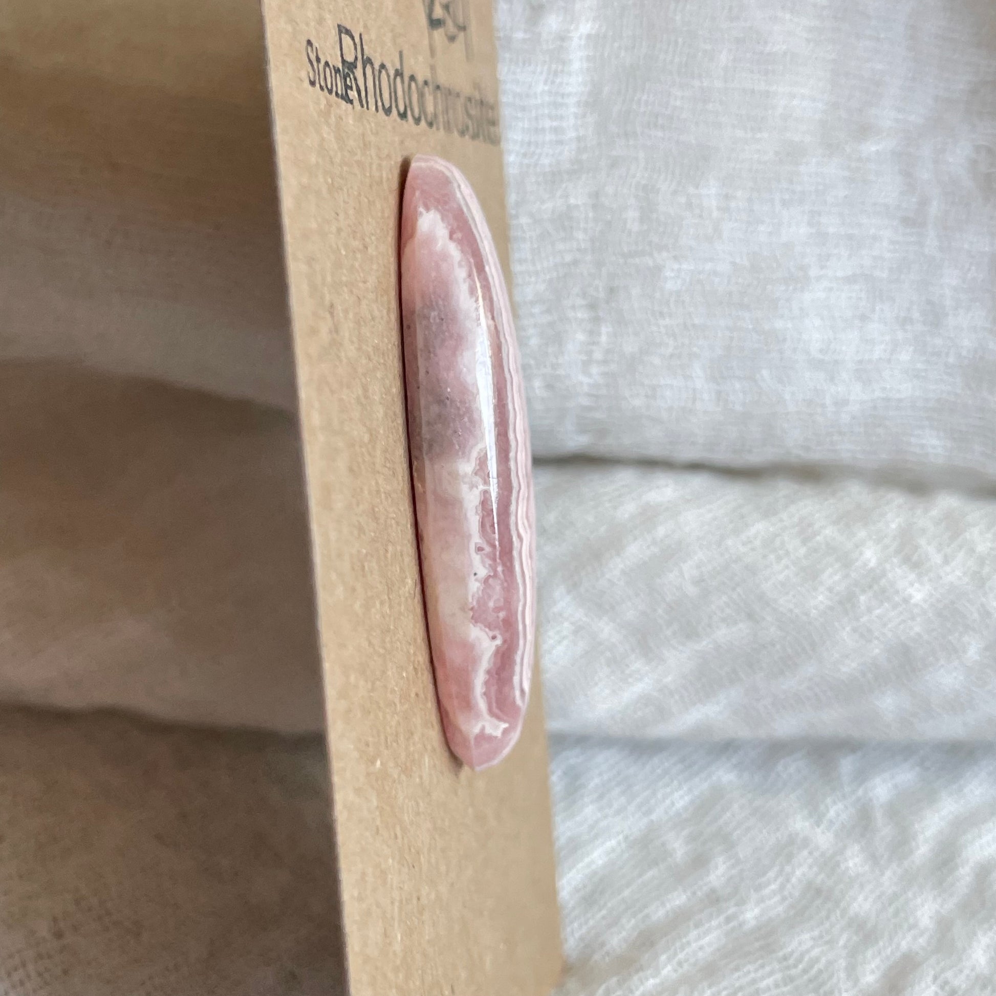 Rhodochrosite Cabochon - R84 F7B395BA-15FC-43FA-8604-ABF89D84A8E1 Brandedandwild.com