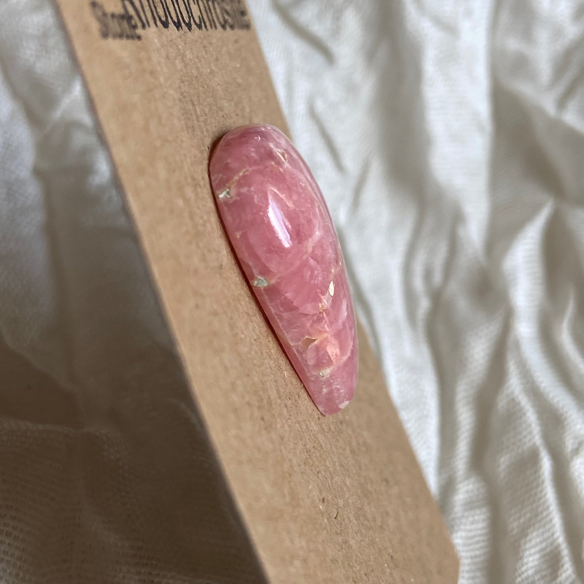 Rhodochrosite Cabochon - R060 F863C70B-FAA3-4CFE-B834-67F4FED7892D Brandedandwild.com