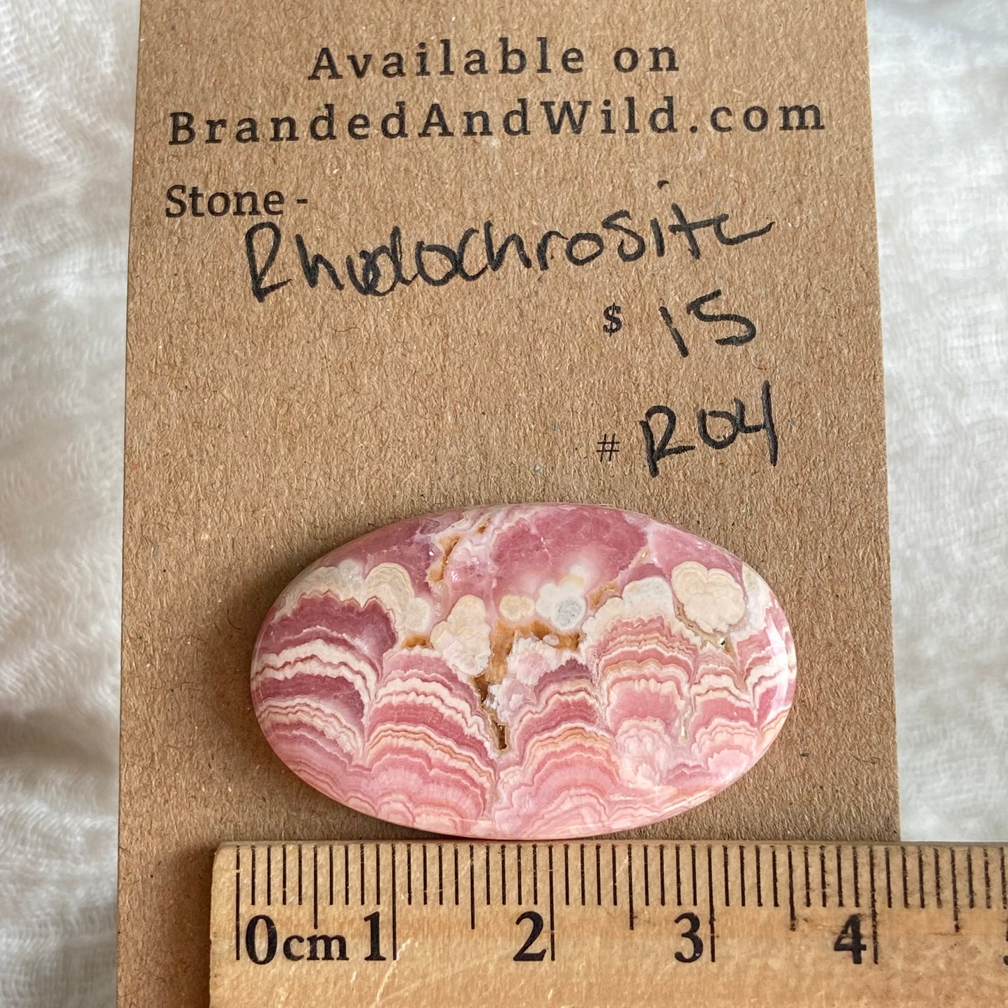 Rhodochrosite Cabochon - R04 FE0EC1EF-D539-49D4-80DA-884A9E7E00D1 Brandedandwild.com